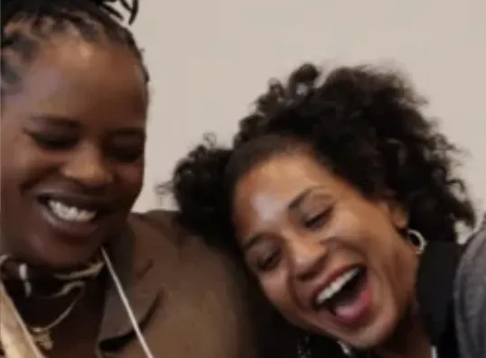 Alumni laughing